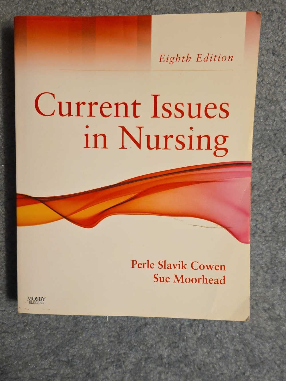 Current Issues in Nursing Textbook - White/Orange/Pink Cover